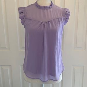 Purple sleeveless blouse with sheer layer with ruffle detail. Worn 1x. Size S.